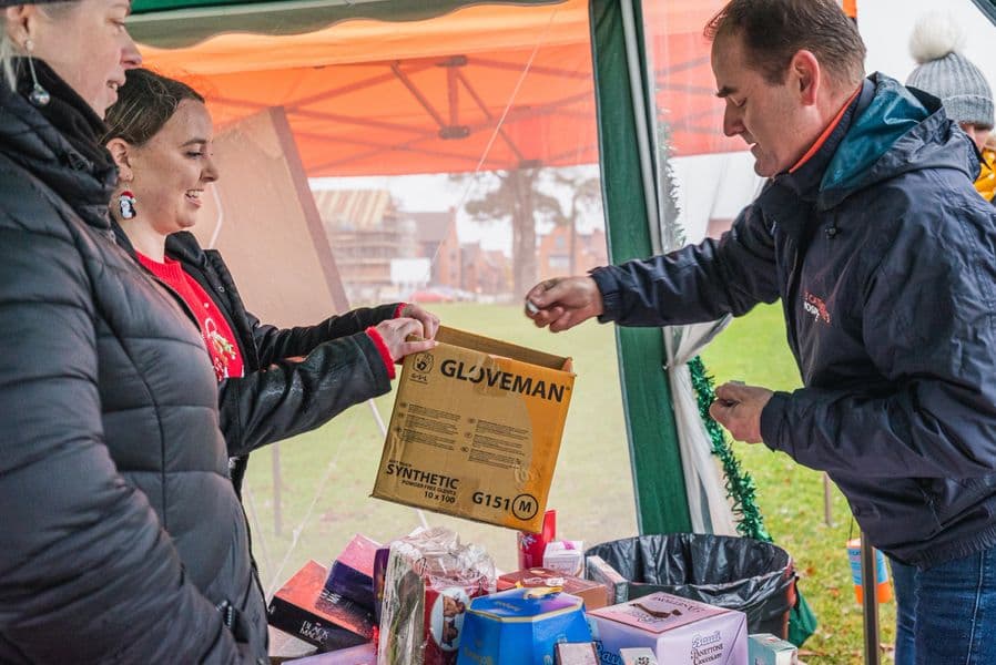 Woodgate community raffle at a Christmas event