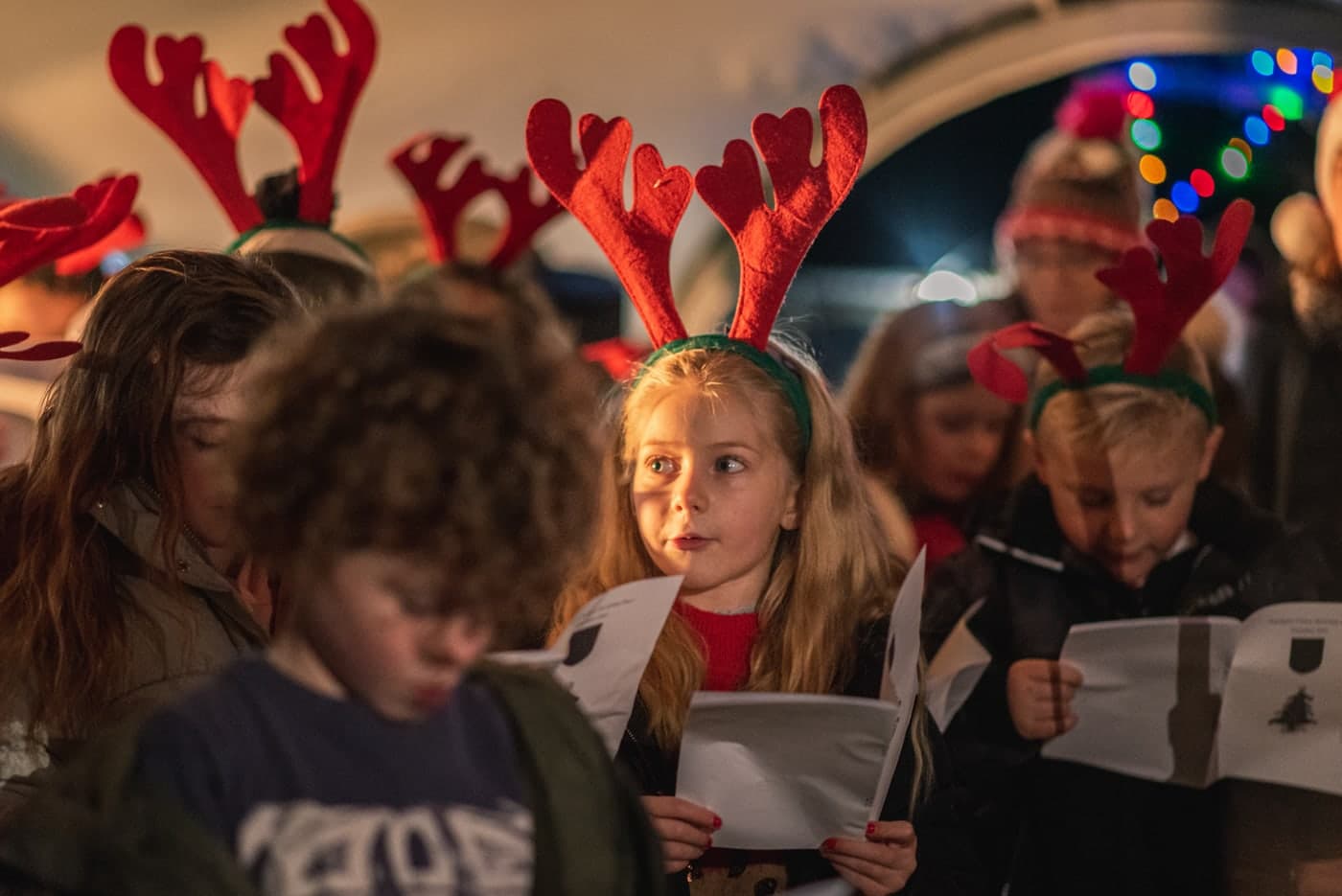 Children singing carols at the 2021 Christmas on the Green event