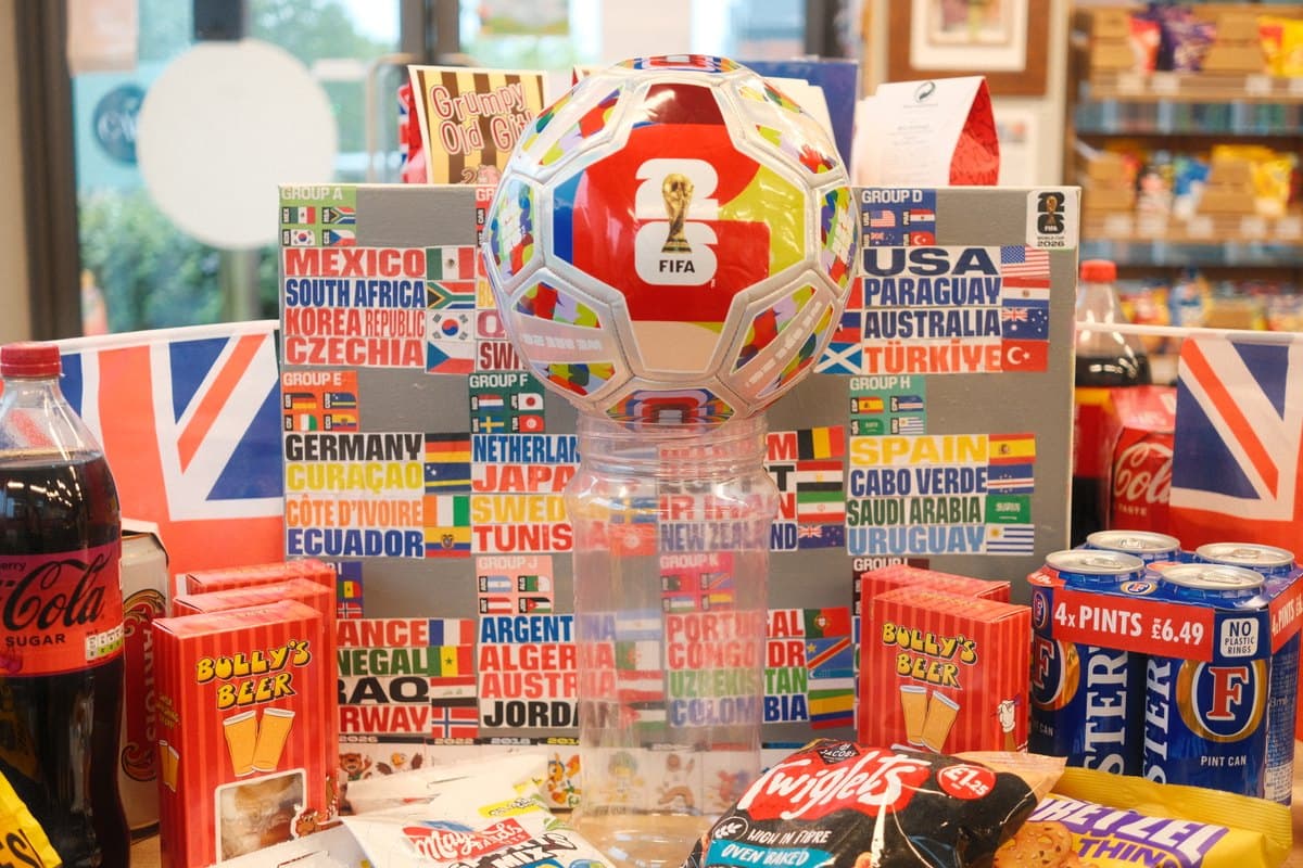 FIFA 2026 football displayed with World Cup snacks in Woodgate Community Shop