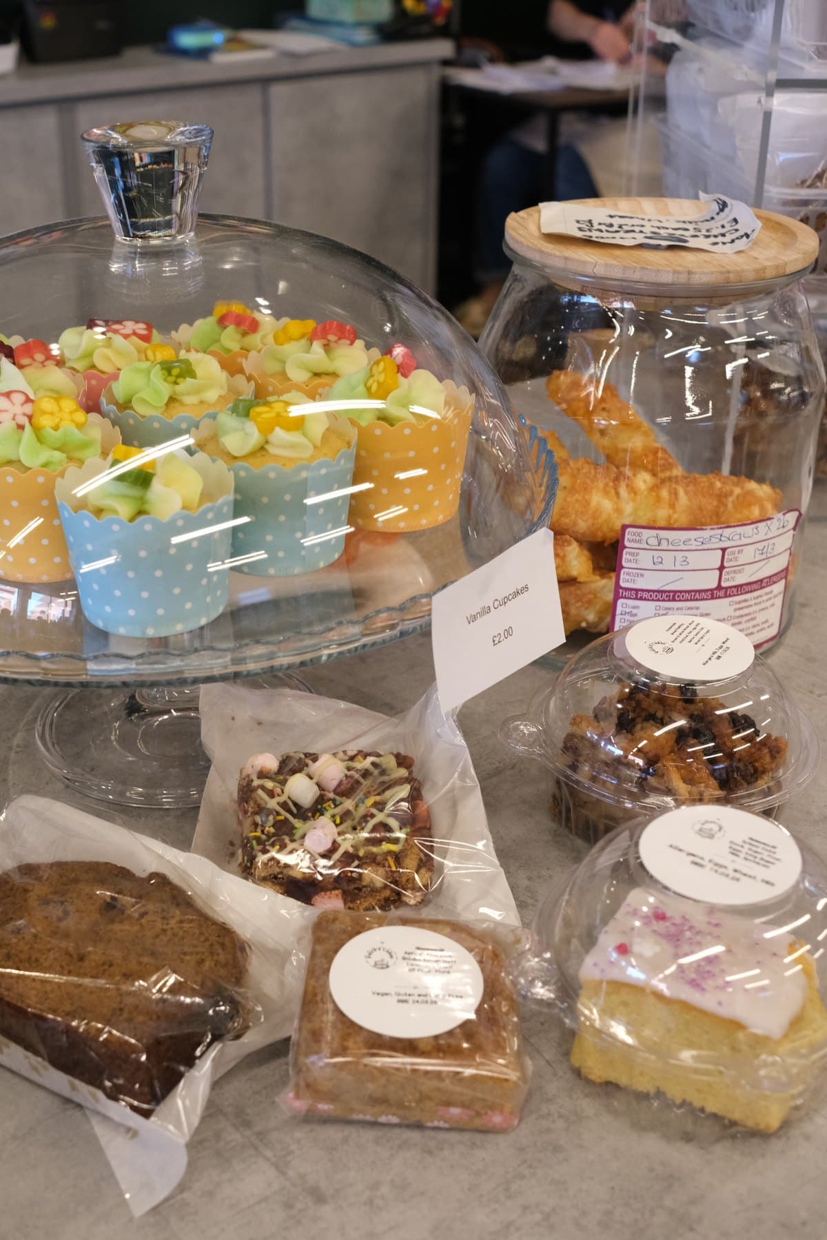 Petra's Cakes cupcakes and bakes displayed at Woodgate Community Shop